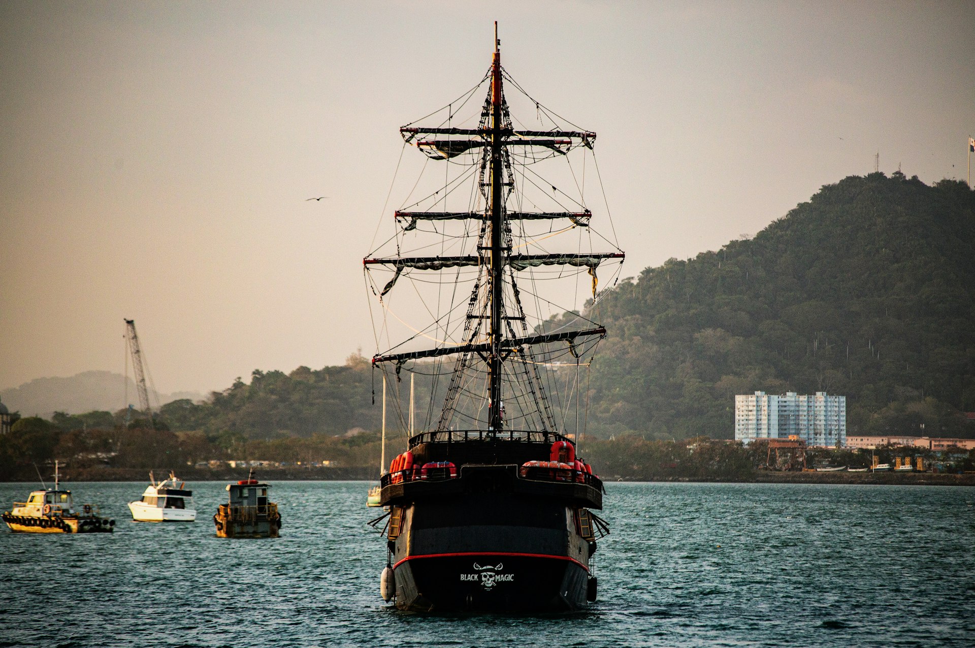 A large boat floating on top of a large body of water